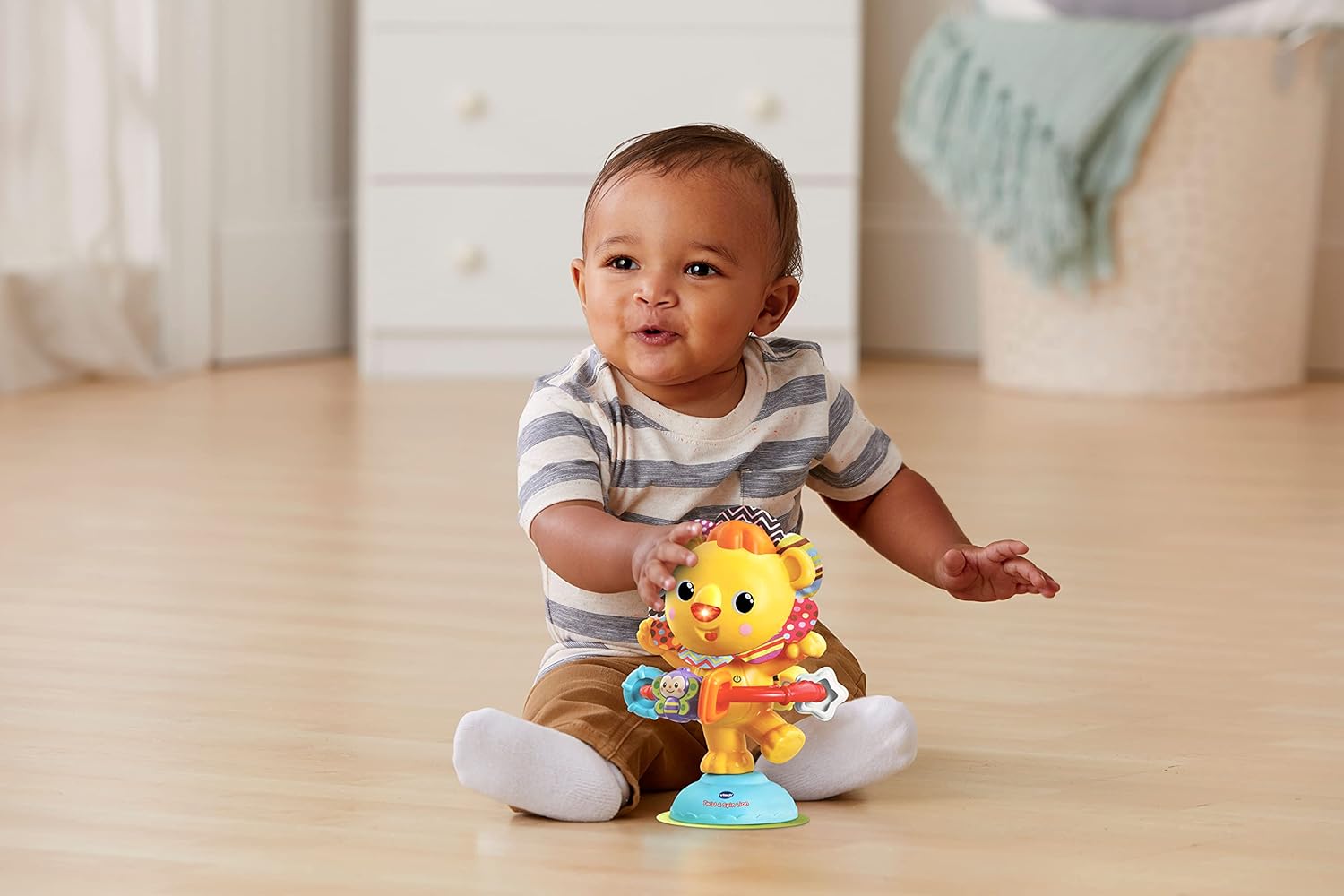 VTech Twist and Spin Lion - Interactive Musical Toy with Lights & Suction Cup for 6+ Months 3
